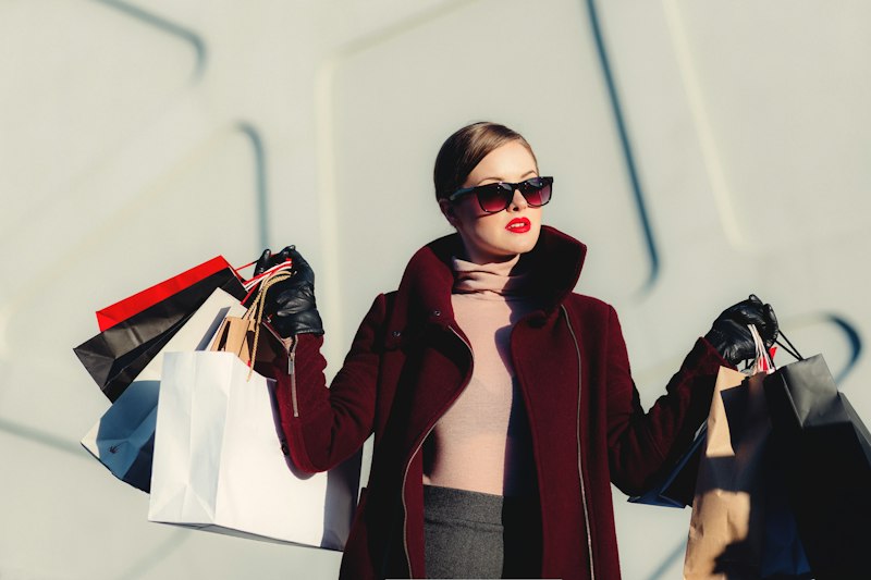 Happy shopping woman with bags